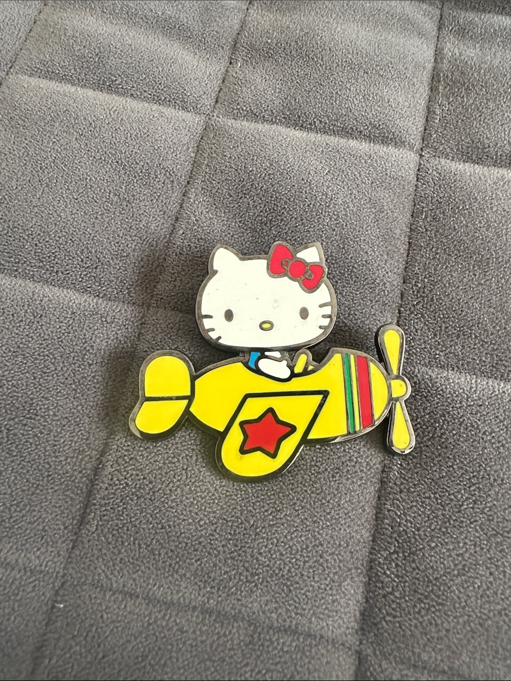 Hello Kitty Yellow Airplane Pin with Red Bow
